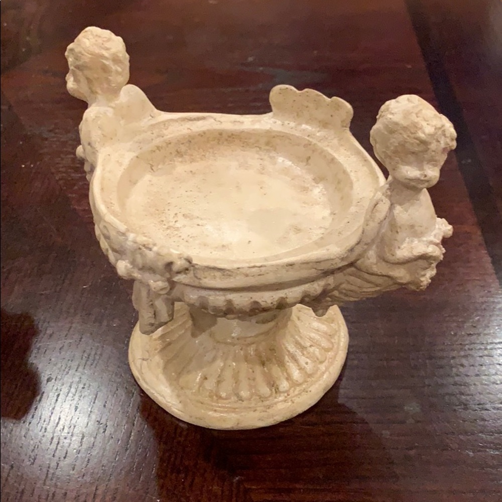 Pair of cherub candleholders